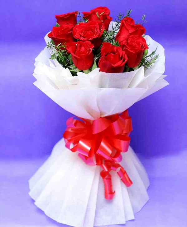 Red Roses With White Paper Packing