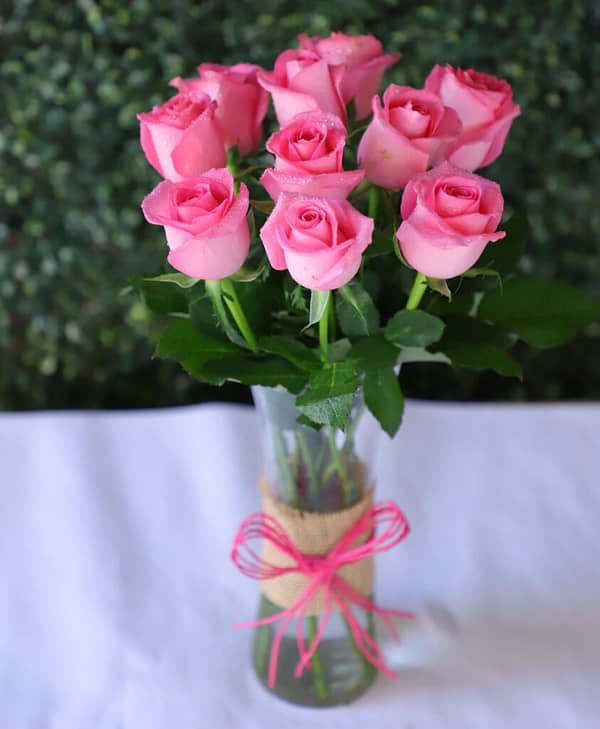 Pink Roses Bunch In Glass Vase