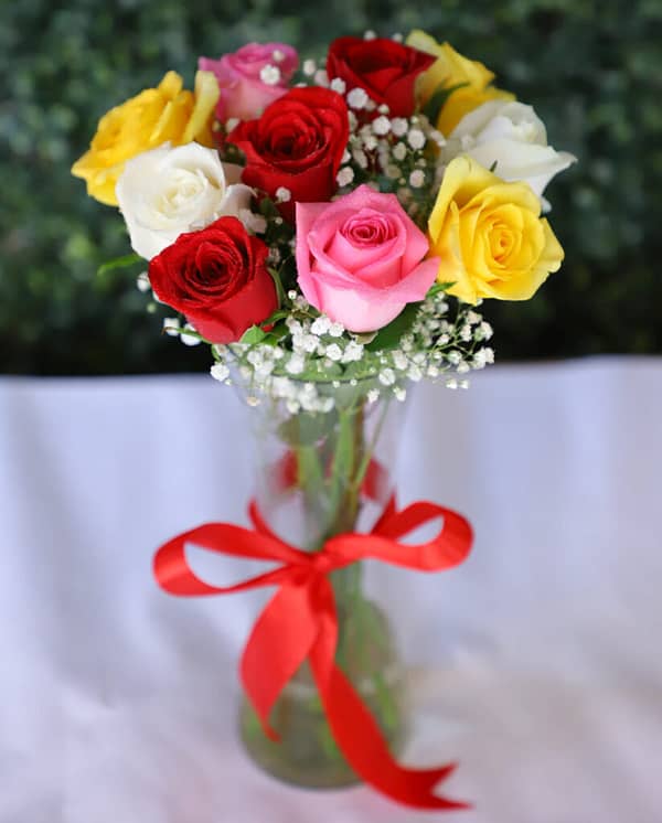 Mix Color Roses In Glass Vase